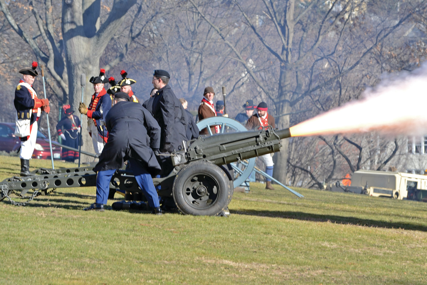 SHOTS VOLLEYED: A 19-gun salute fired off by the Rhode Island Militia and National Guard caused nearby car alarms to sound off, but provided excitement.